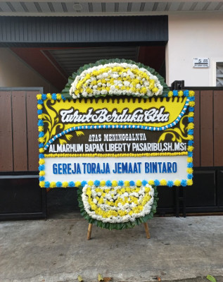 Papan Bunga Duka di Mananggu